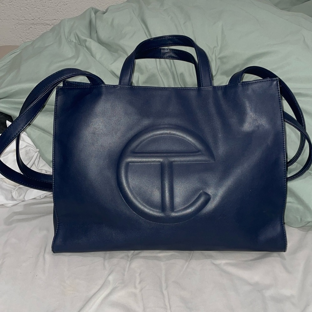 Navy blue Telfar bag - Medium 
Well used 
All impurities listed in photos - Picture 2 of 7